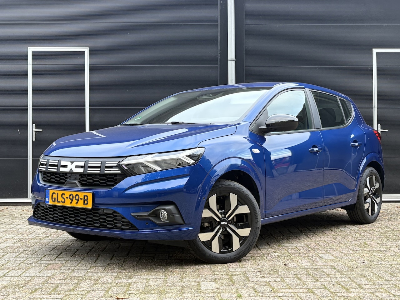 Dacia Sandero - 1.0 TCe 90 Journey | Trekhaak | NL-auto - AutoWereld.nl