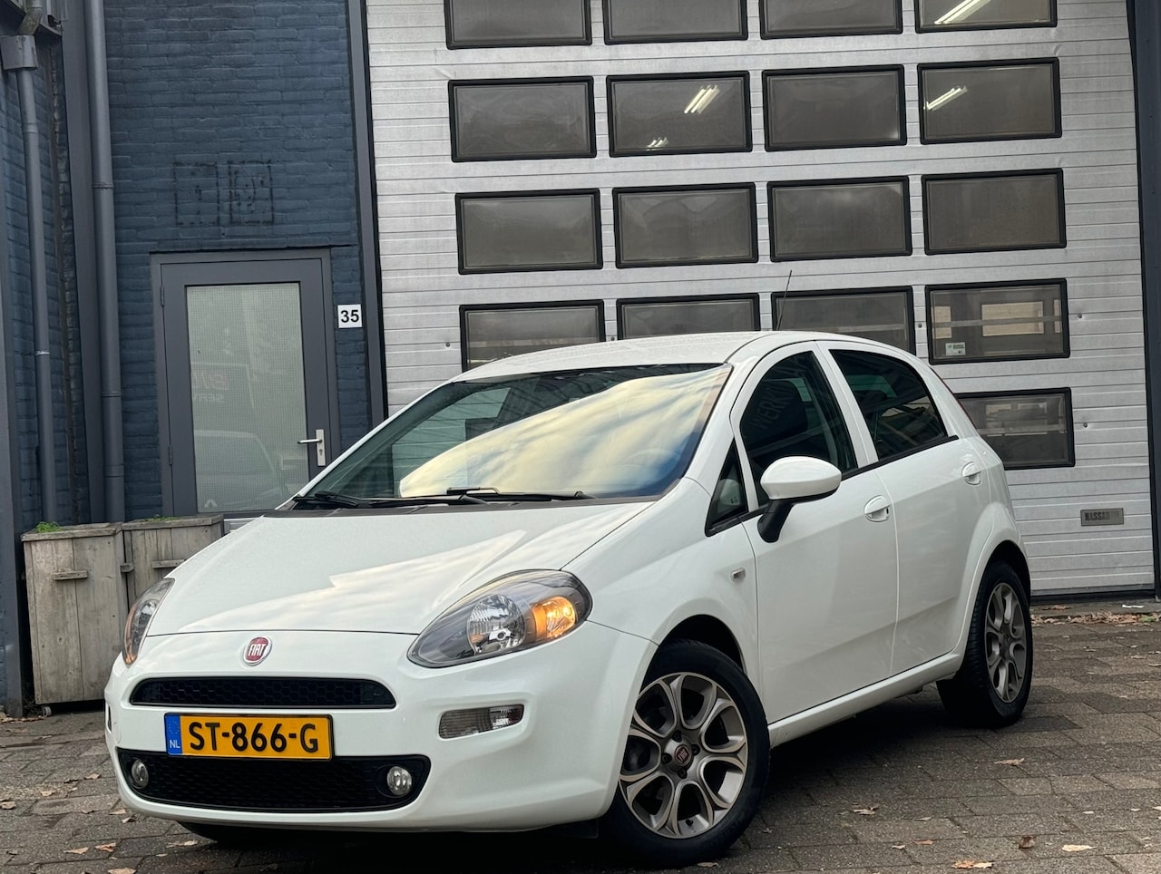 Fiat Punto Evo - 0.9 TwinAir Sempre | Clima | Navi | Cruise | N.A.P - AutoWereld.nl