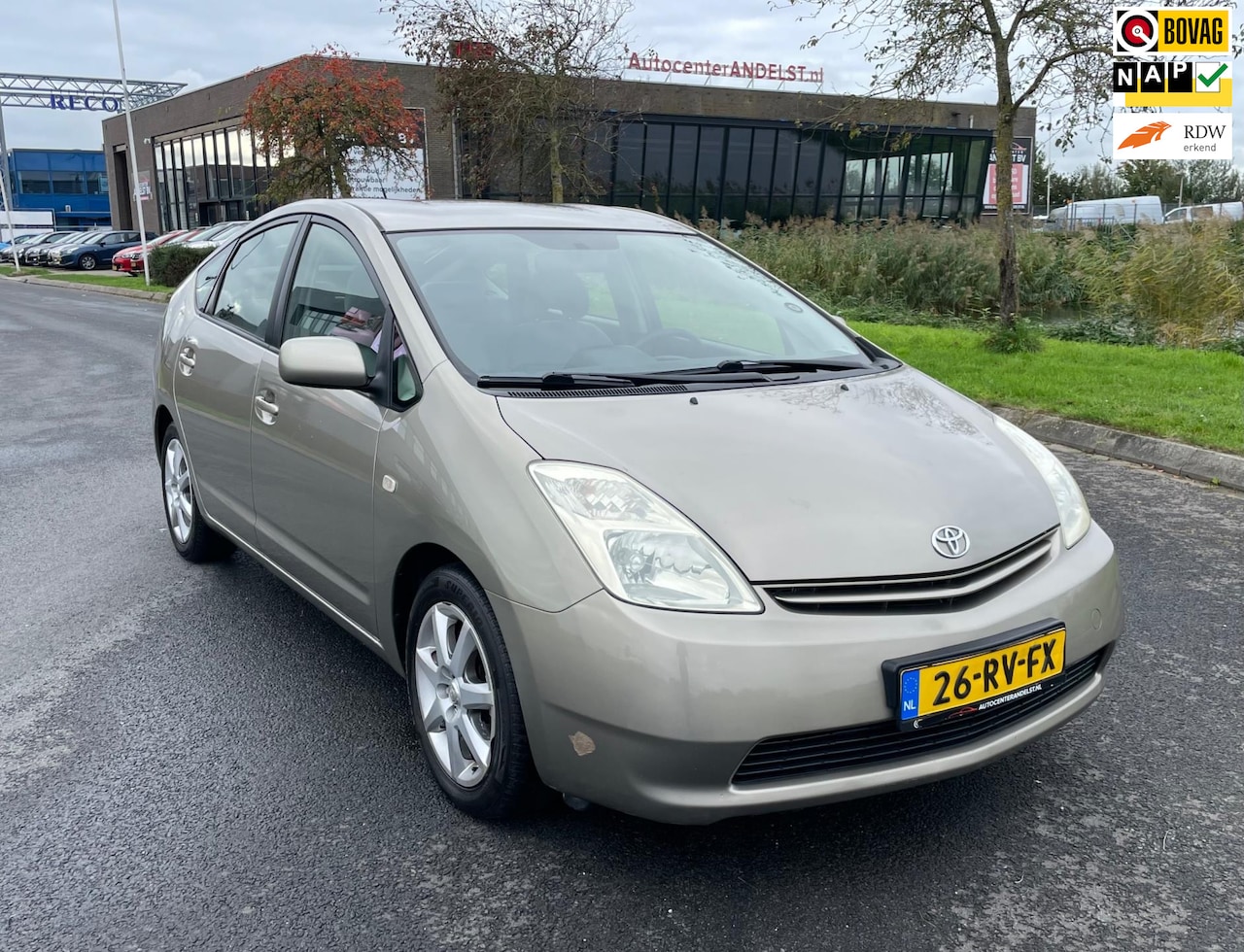 Toyota Prius - 1.5 VVT-i 1.5 VVT-i, Aut, Pdc, Cruise/Climate control, Elektr ramen, Geen import, Nap! - AutoWereld.nl
