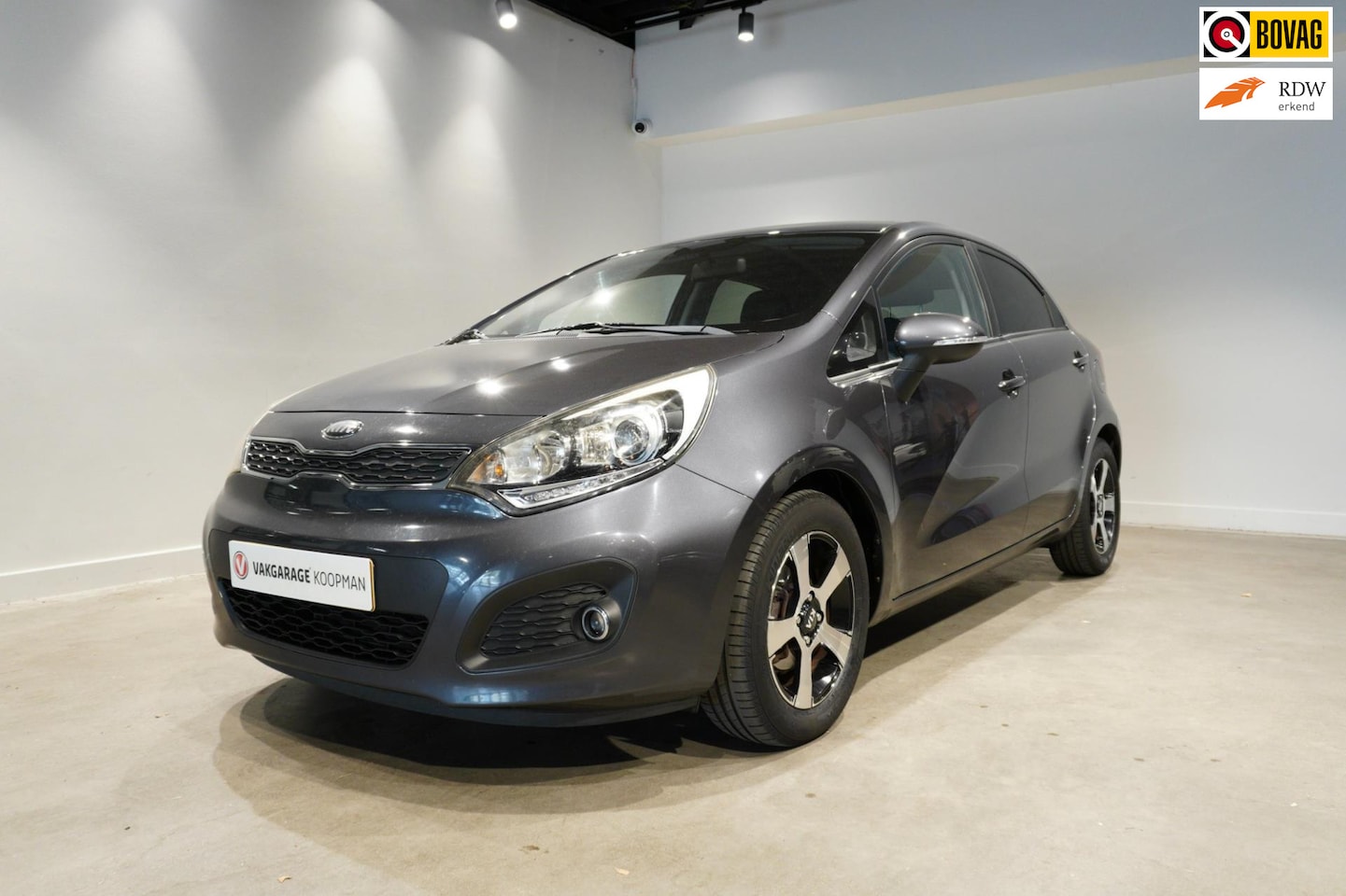 Kia Rio - 1.2 CVVT Design Edition PDC, Airco, Start&Stop - AutoWereld.nl