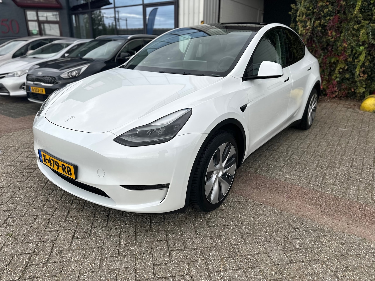 Tesla Model Y - Long Range AWD 75 kWh Long Range AWD 75 kWh - AutoWereld.nl