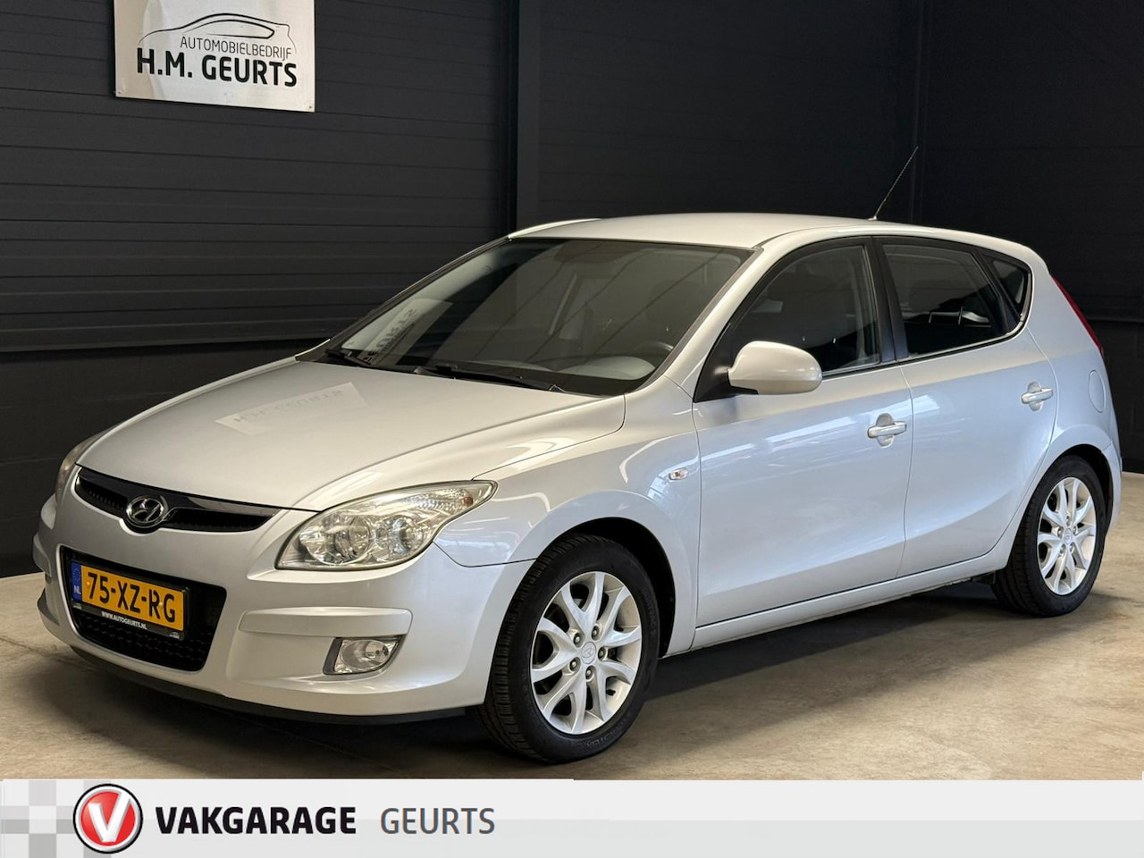 Hyundai i30 - 1.4i Dynamic Luxe Airco Lm Velgen Fully Serviced! - AutoWereld.nl