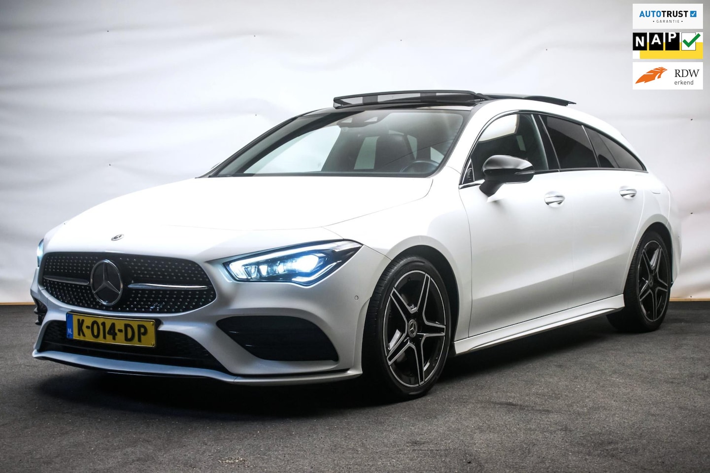 Mercedes-Benz CLA-klasse Shooting Brake - 180 Business Solution AMG Night Edition ORG NL [ Pano Sfeer Matrix Memory El Trekhaak ] - AutoWereld.nl
