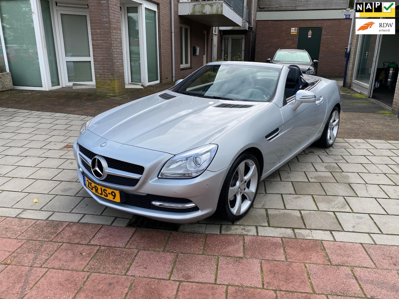 Mercedes-Benz SLK-klasse - 200 AMG velgen leer navi cruisecontrol automaat vol opties 72620 km - AutoWereld.nl