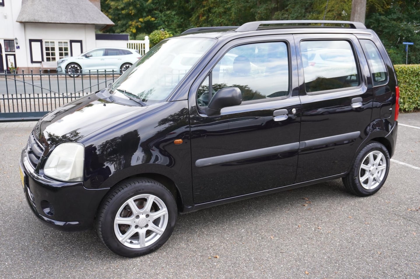 Suzuki Wagon R+ - 1.0 Comfort Airco Trekhaak - AutoWereld.nl