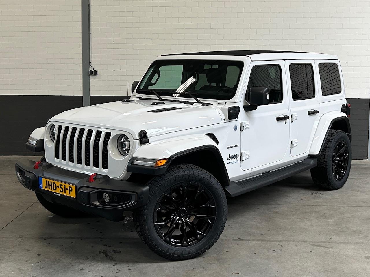 Jeep Wrangler Unlimited - 4xe cabrio, 20 inch, Apple - Android ect. - AutoWereld.nl