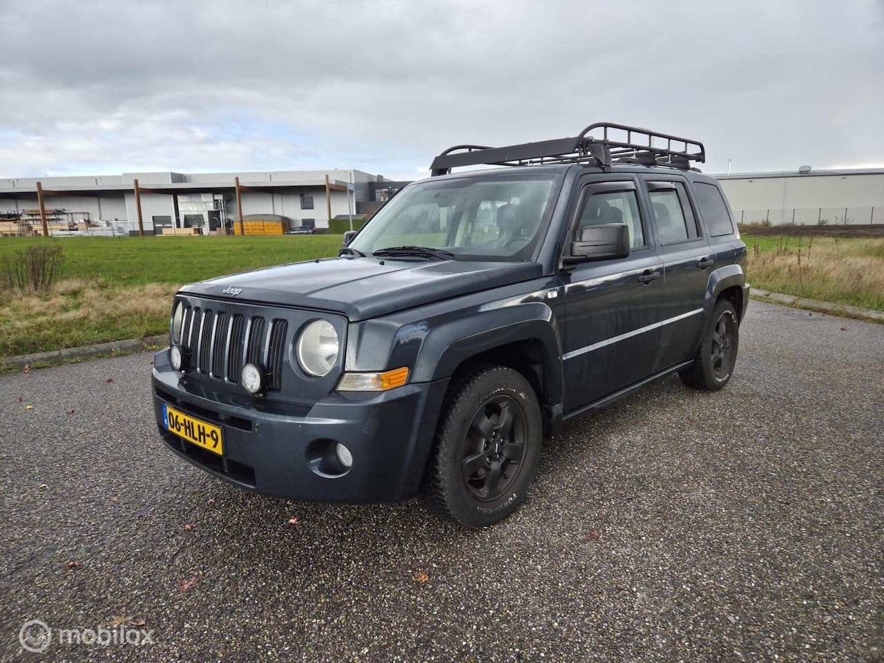 Jeep Patriot - 2.4 Limited 4X4 / NIEUWE APK / AIRCO / TREKHAAK - AutoWereld.nl