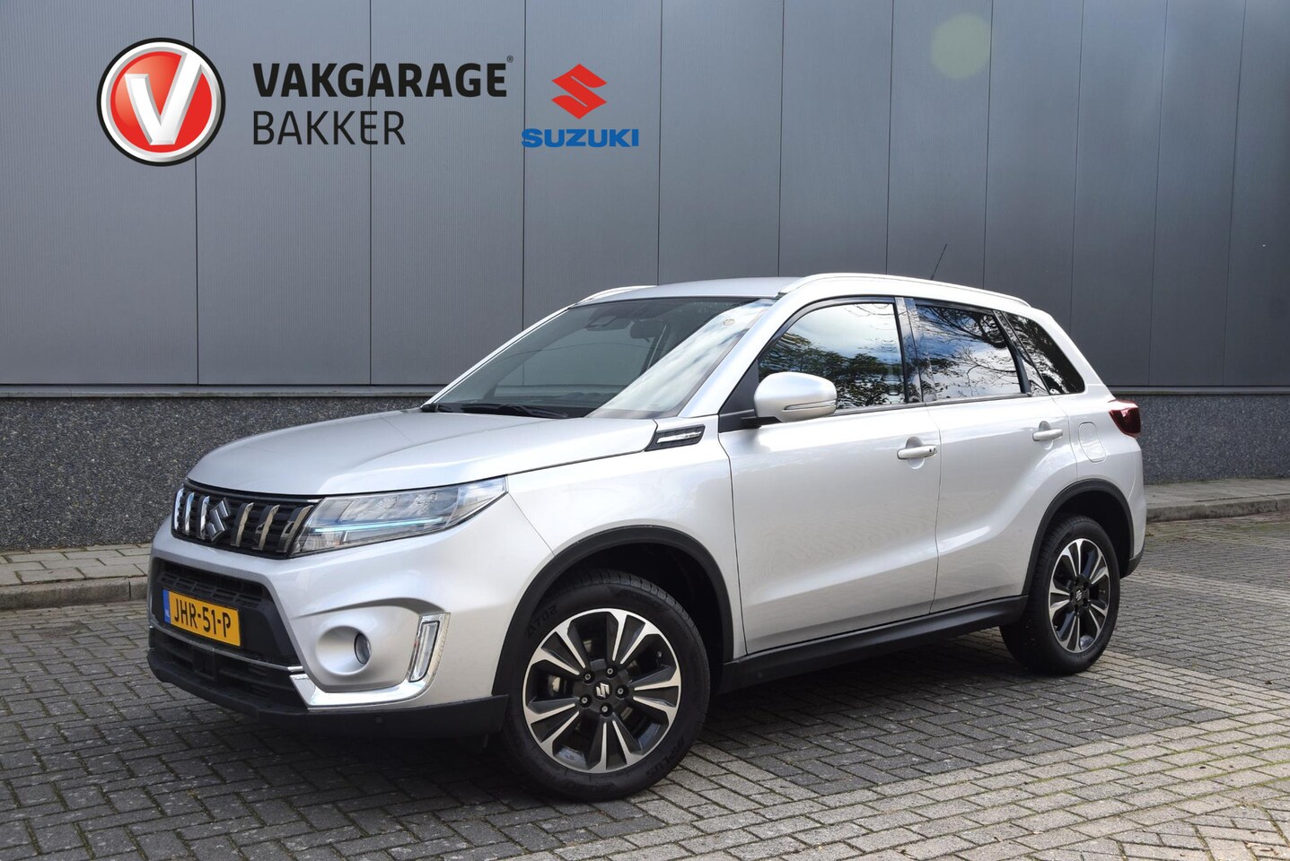 Suzuki Vitara - 1.4 Boosterjet Style Smart Hybrid | Fabrieksgarantie | Lederen bekleding | Parkeersensoren - AutoWereld.nl