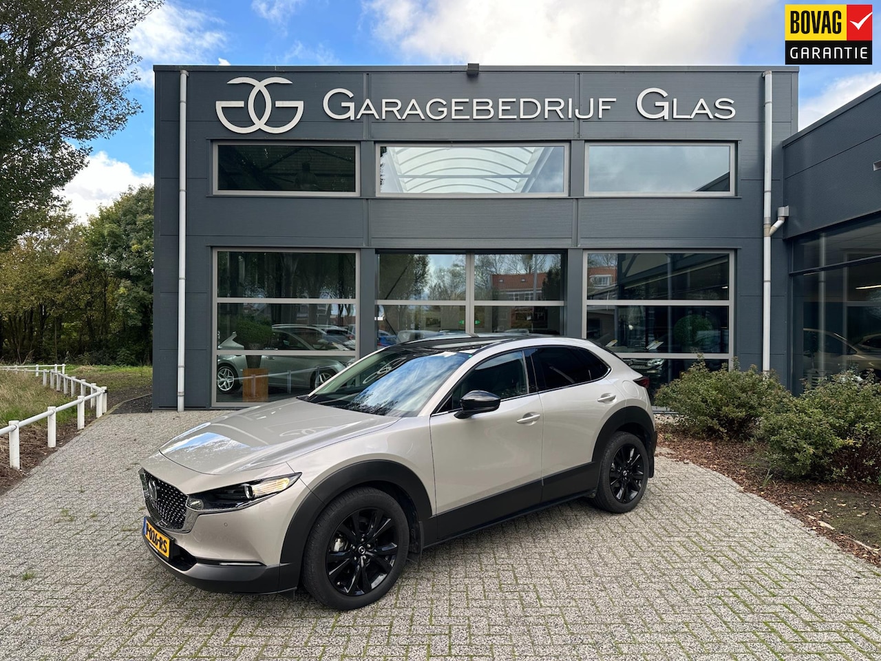 Mazda CX-30 - 2.0 e-SkyActiv-X M Hybrid Homura two tone uniek - AutoWereld.nl