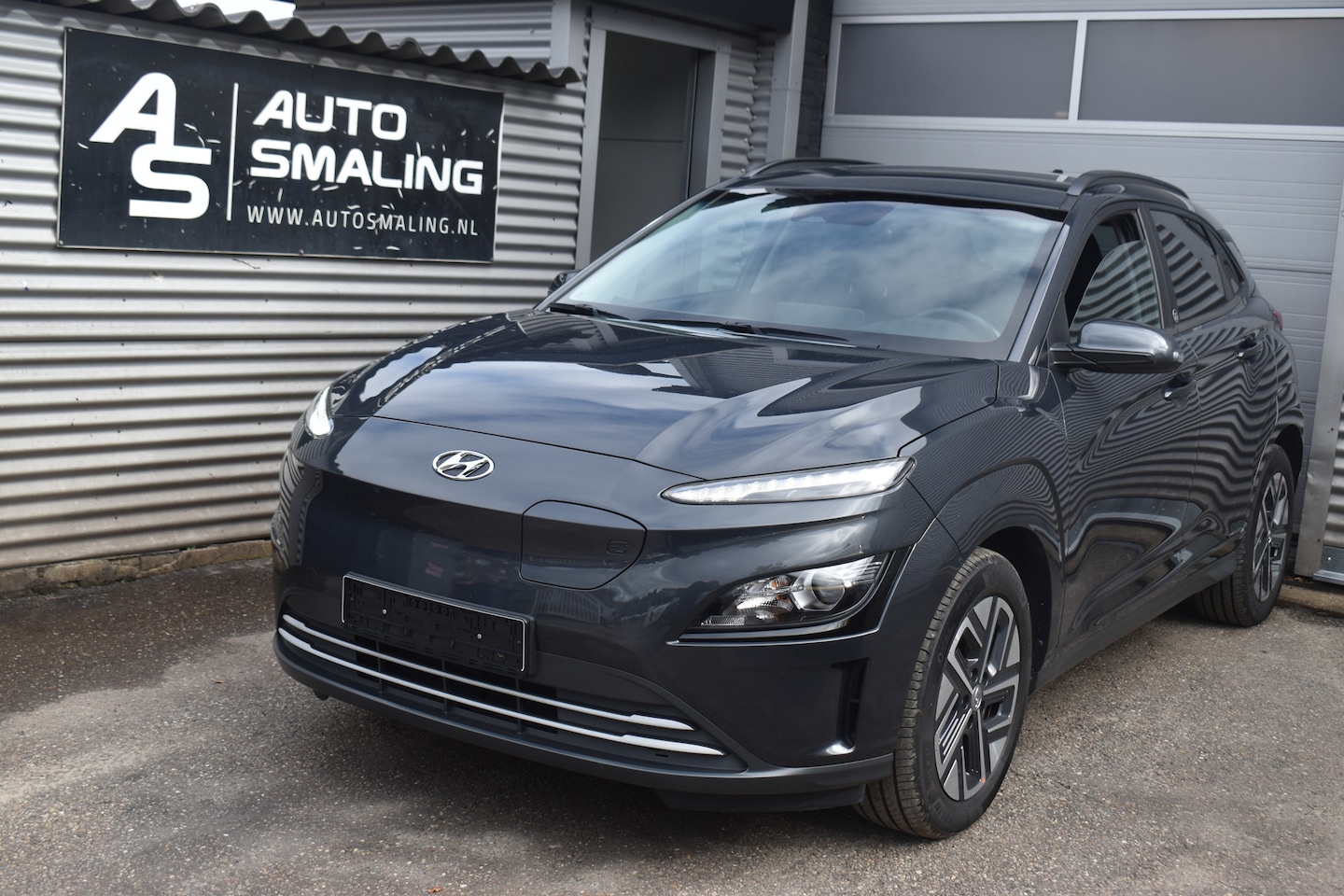 Hyundai Kona - 39Kwh Comfort 136Pk SOH 100% 3FASE *Navi/Clima/Camera/Stoelverwarming - AutoWereld.nl