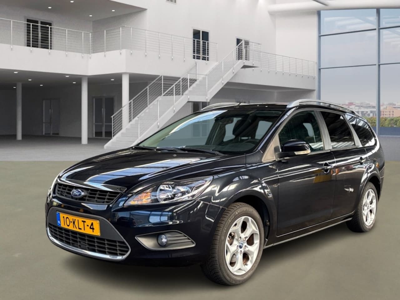 Ford Focus Wagon - 1.8 Limited/NAVIGATIE/TREKHAAK - AutoWereld.nl