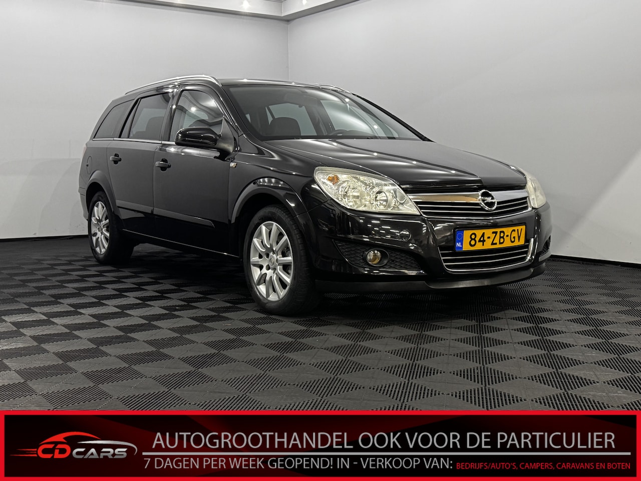 Opel Astra Wagon - 1.6 Cosmo Leder, Navi, Stoelverwarming, Clima, Lichtmetalen velgen - AutoWereld.nl