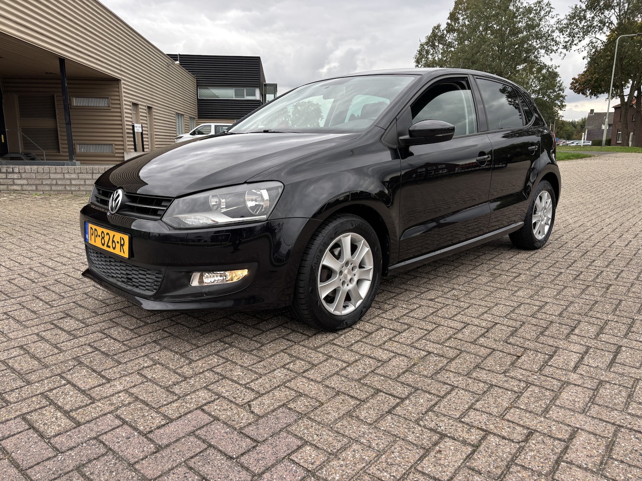 Volkswagen Polo - 1.2-12V Comfortline 5 Deurs [ ecc,audio,lmv,pdc,trekhaak ] - AutoWereld.nl
