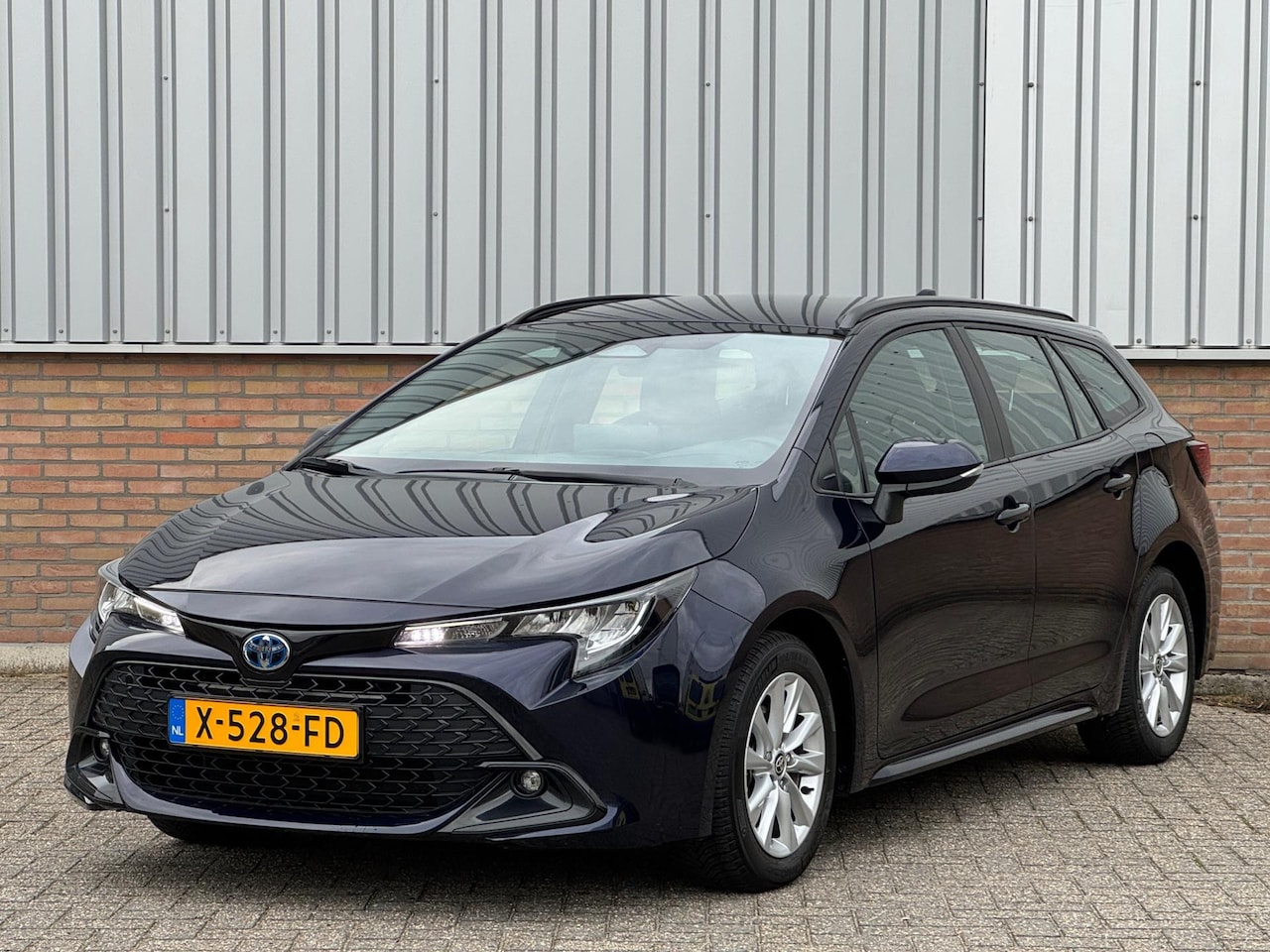 Toyota Corolla Touring Sports - Hybrid 140 Active - AutoWereld.nl
