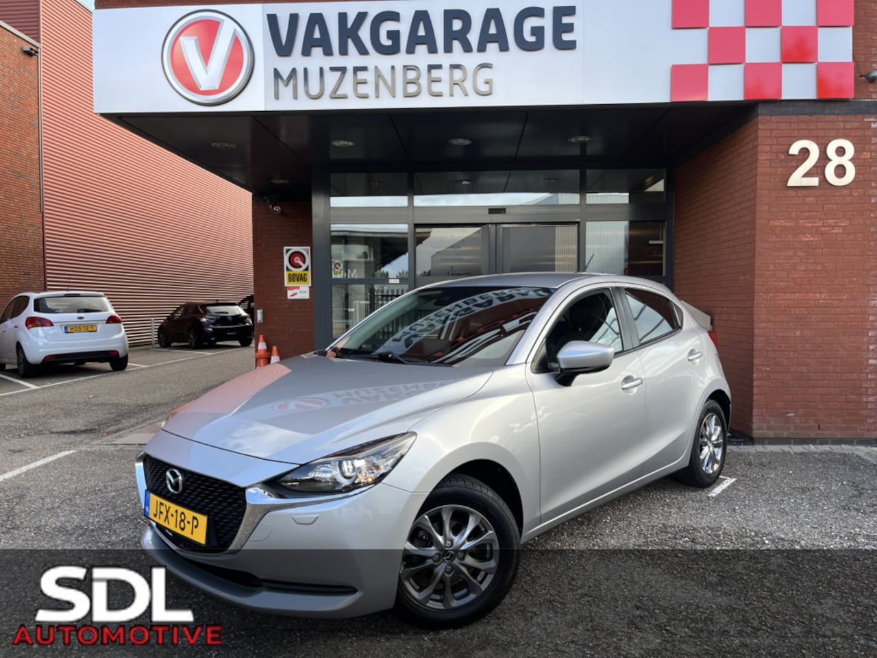 Mazda 2 - 1.5 Skyactiv-G Comfort // NAVI + CARPLAY // PDC // CRUISE // AIRCO // STOELVERWARMING - AutoWereld.nl