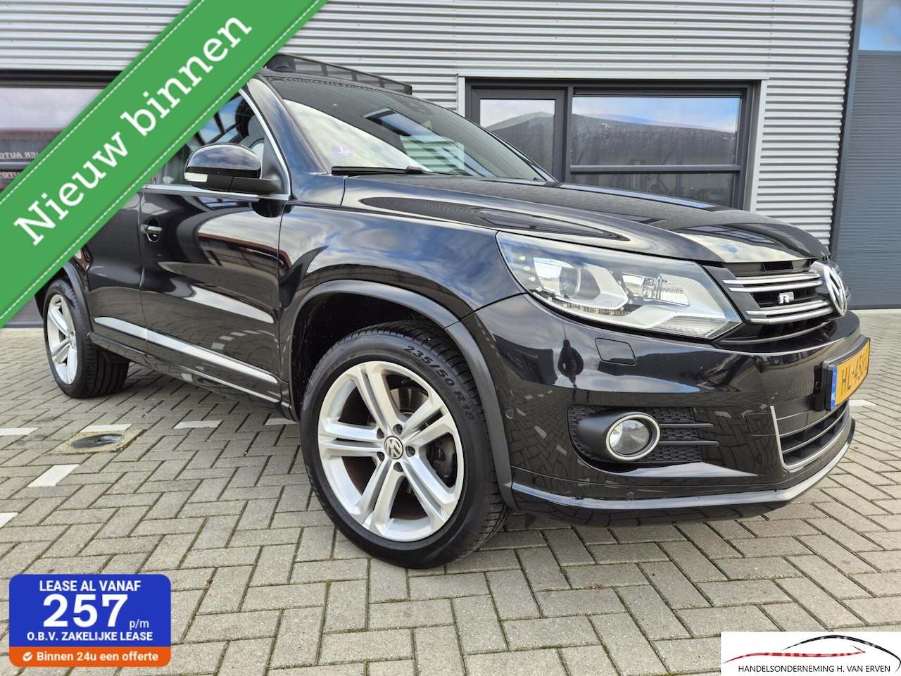 Volkswagen Tiguan - 1.4 R-Line SCHUIFKANTELDAK XENON LED NAP - AutoWereld.nl