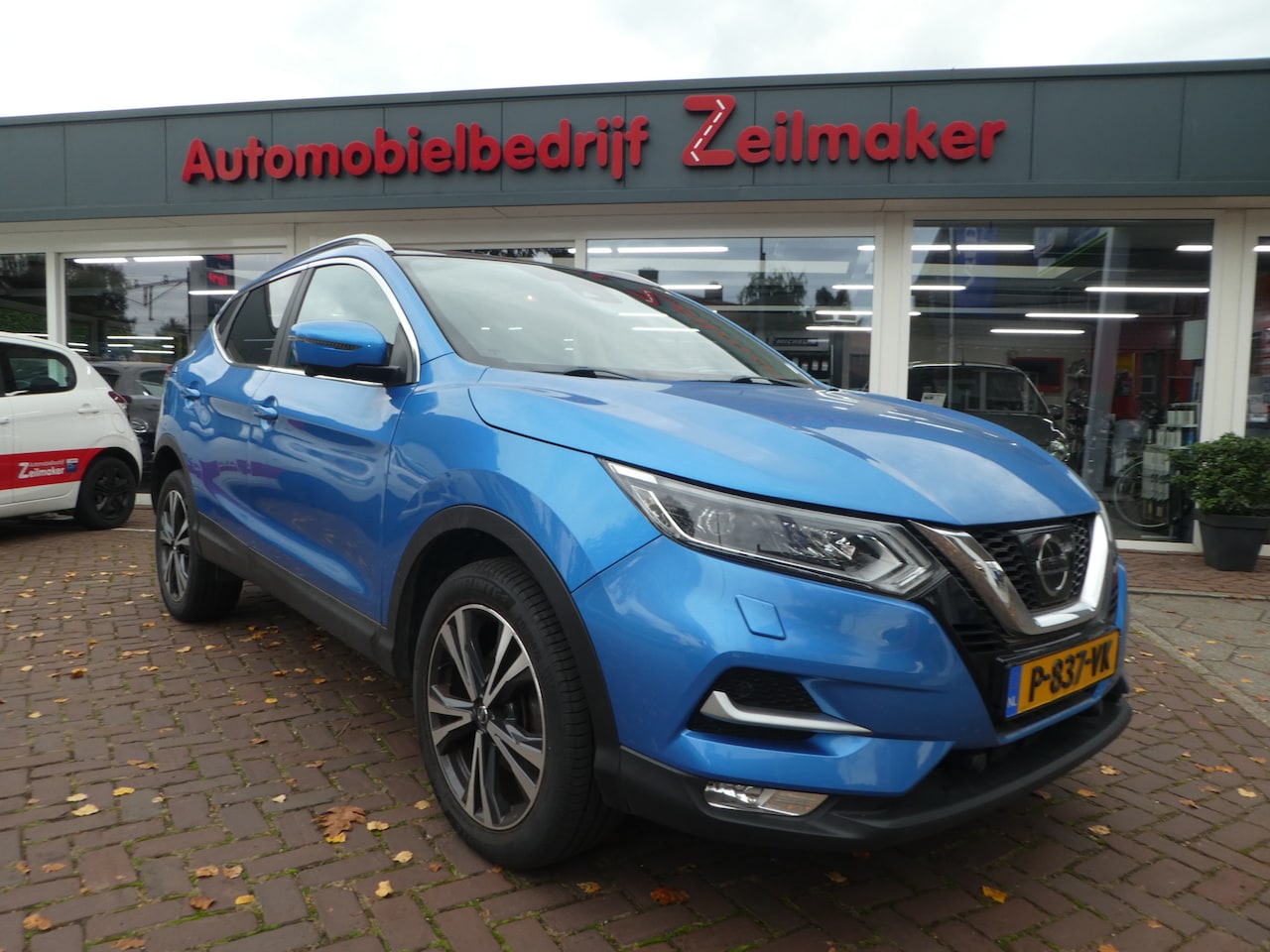 Nissan Qashqai - 1.2 Business Edition Pano dak, 360 Camera, Trekhaak, Clima, Navi, 18 " Lm - AutoWereld.nl