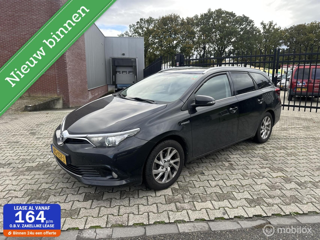 Toyota Auris - 1.8 Hybrid Trend panorama dak camera - AutoWereld.nl