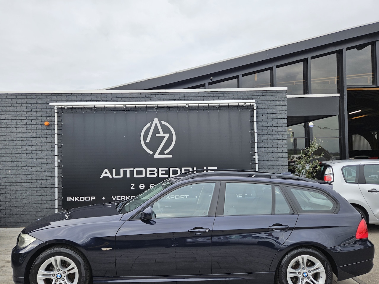 BMW 3-serie Touring - 318i Business Line *Navi*AC* - AutoWereld.nl