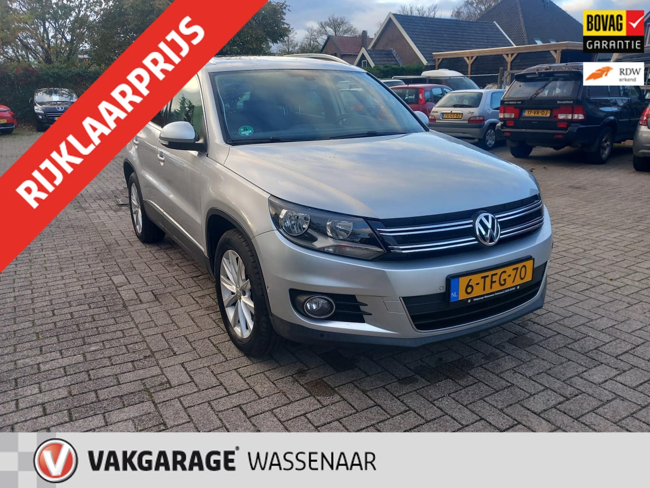 Volkswagen Tiguan - 1.4 TSI Sport&Style 161pk automaat trekh pano - AutoWereld.nl