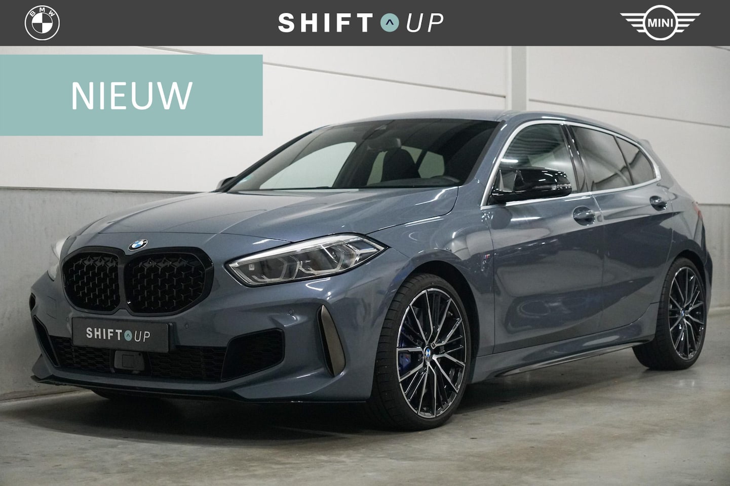 BMW 1-serie - M135i xDrive Harman Kardon | Head Up | Elektr. Stoelen | Stuurverwarming - AutoWereld.nl