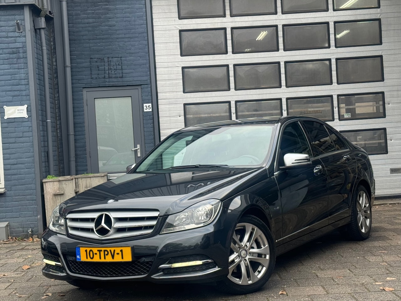 Mercedes-Benz C-klasse - 180 Premium Edition | Clima | Navi | Automaat | PDC V+A - AutoWereld.nl