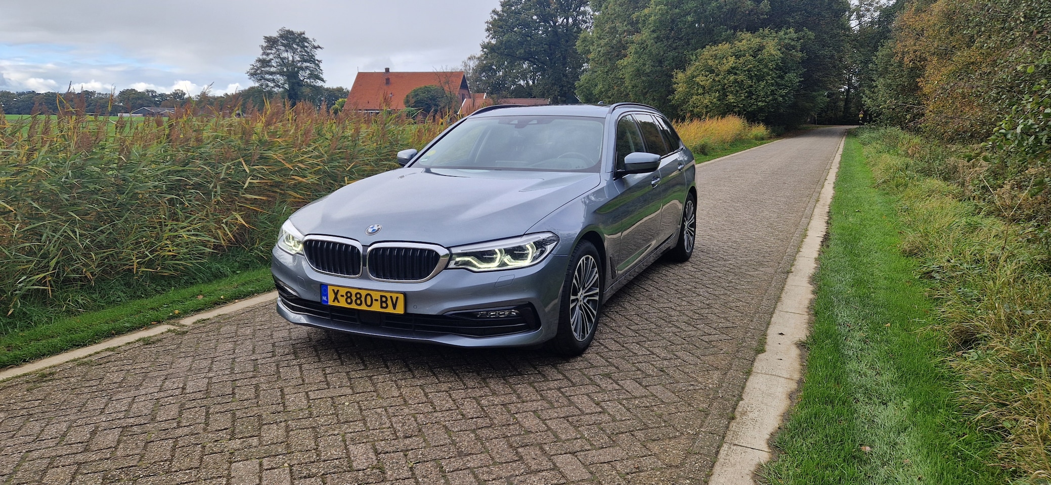 BMW 5-serie Touring - 530d xDrive High Executive Headup pano line+adapted cc - AutoWereld.nl