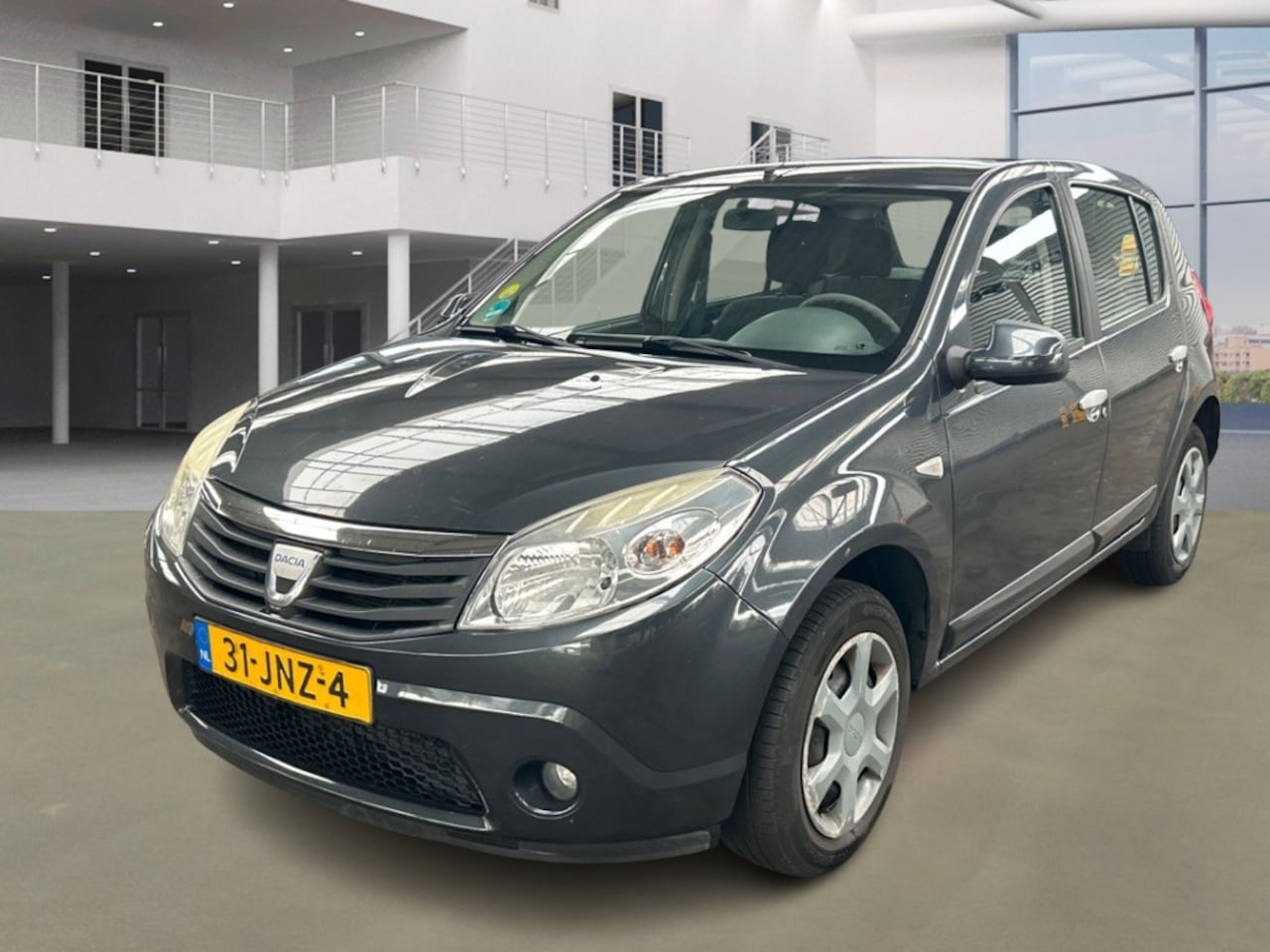 Dacia Sandero - 1.2 Lauréate/ LAAG KM - AutoWereld.nl
