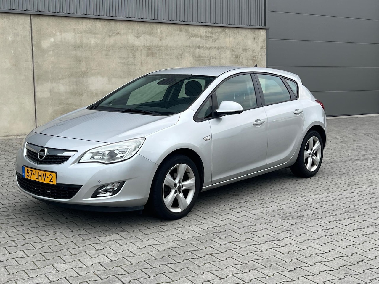 Opel Astra - 1.4 Turbo Edition NAVIGATIE+CRUISE CONTROL+PDC+AIRCO+TREKHAAK+APK 05-04-2026+BOEKJES AANWE - AutoWereld.nl
