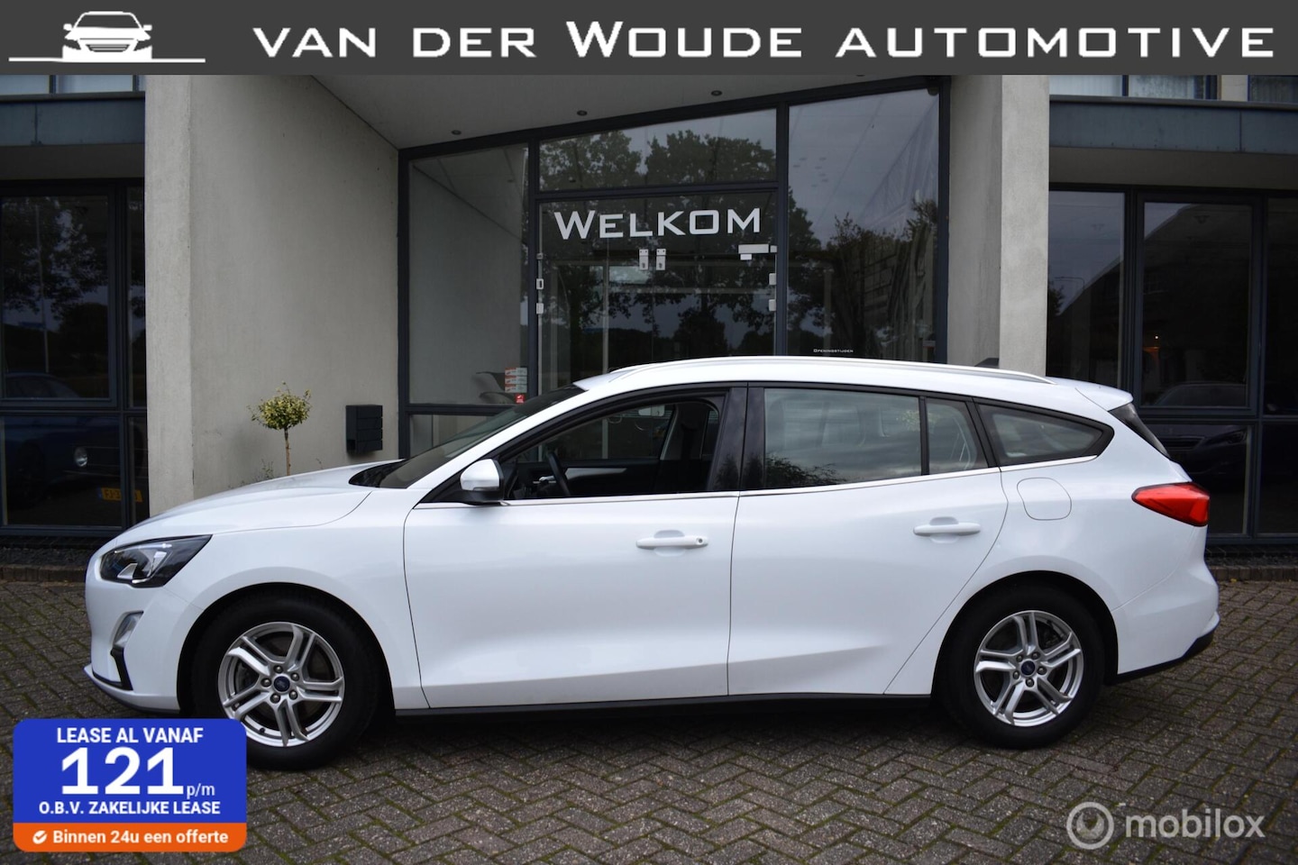 Ford Focus Wagon - 1.0 EcoBoost Hybrid Trekhaak AGR Navi|LED - AutoWereld.nl