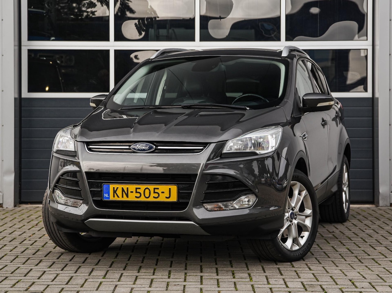 Ford Kuga - 2.0 TDCI Titanium | Navi | Camera | PDC v+a | Half leder | Sportstoelen - AutoWereld.nl