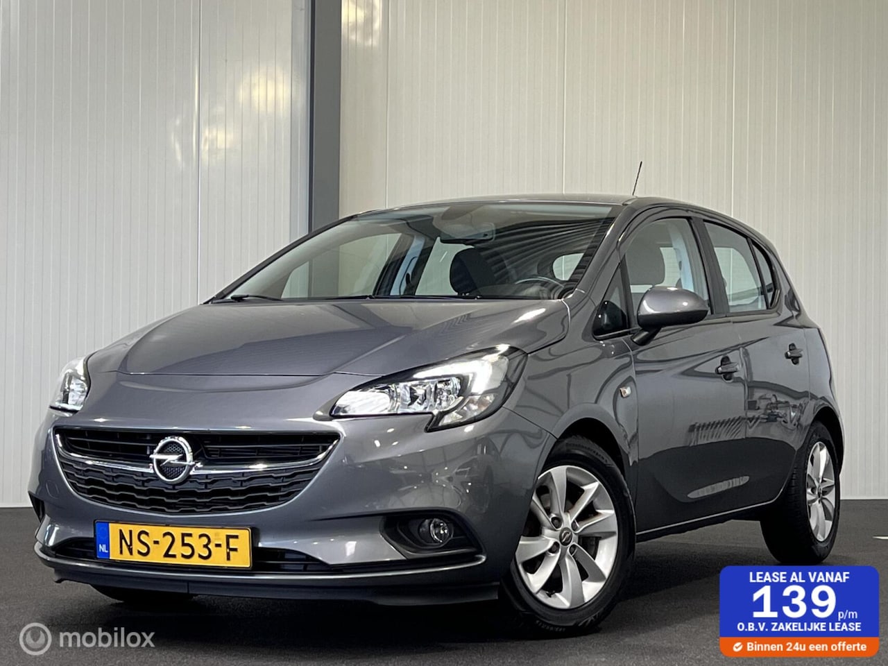 Opel Corsa - 1.4 Business+ 5-drs [ Carplay cruise airco LM ] - AutoWereld.nl