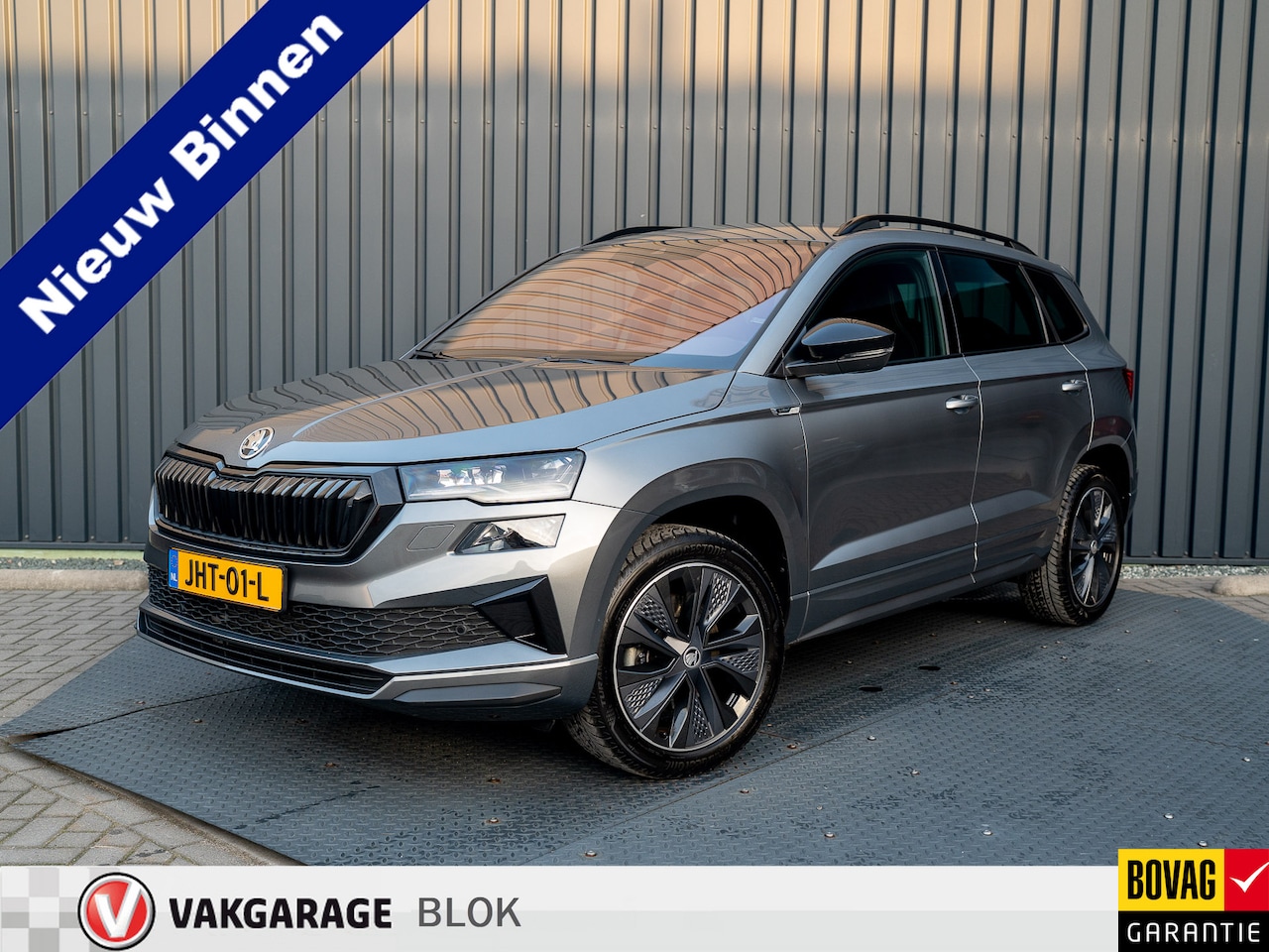 Skoda Karoq - 1.5 TSI 150Pk ACT Sportline Business | Trekhaak wegkl. | Elk. A-klep | Camera | Keyless | - AutoWereld.nl