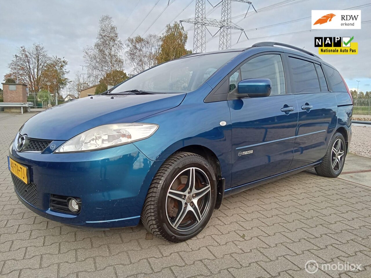 Mazda 5 - 1.8 Luxury Edition/7 persoons/clima/navi/trekh - AutoWereld.nl