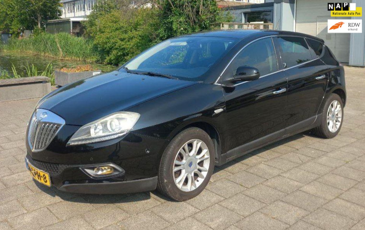 Lancia Delta - 1.4-16V Oro 1.4-16V Oro,airco, navigatie, cruise Controle, aluminium velgen - AutoWereld.nl