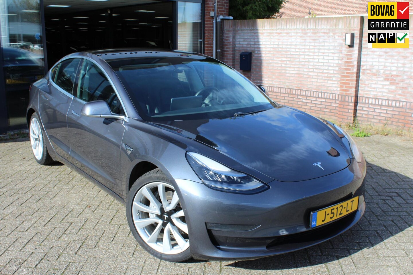 Tesla Model 3 - Long Range RWD Long Range AWD 75 kWh TREKHAAK / 19" LMV / AUTOPILOT / 1e EIG / incl. BTW / LEER / PANODAK - AutoWereld.nl