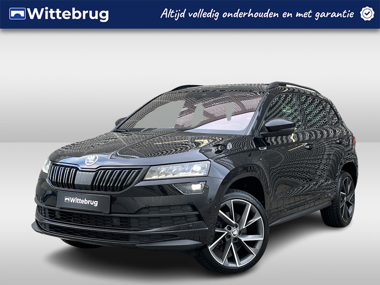 Skoda Karoq - 1.5 TSI 150PK ACT Sportline Business / Panoramadak / Standkachel / Stuur + Stoelverwarming - AutoWereld.nl