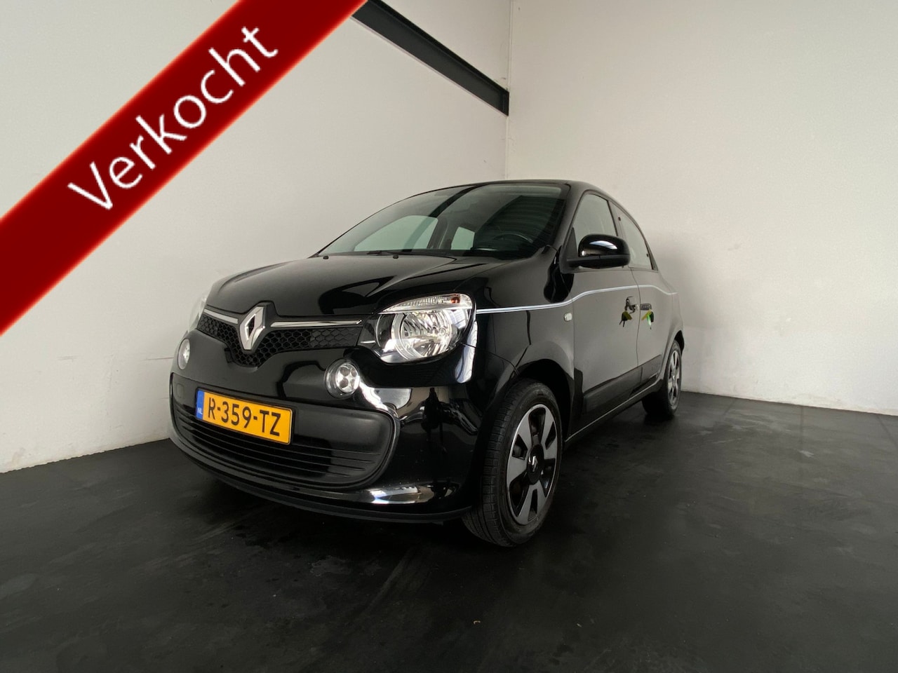 Renault Twingo - 1.0 SCe Limited. Open dak! - AutoWereld.nl