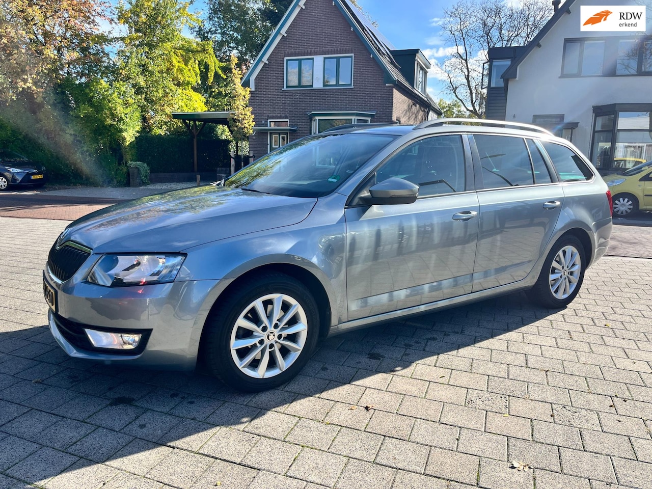 Skoda Octavia Combi - 1.2 TSI Elegance Navi Trekhaak Ecc Isofix PDC NW APK - AutoWereld.nl