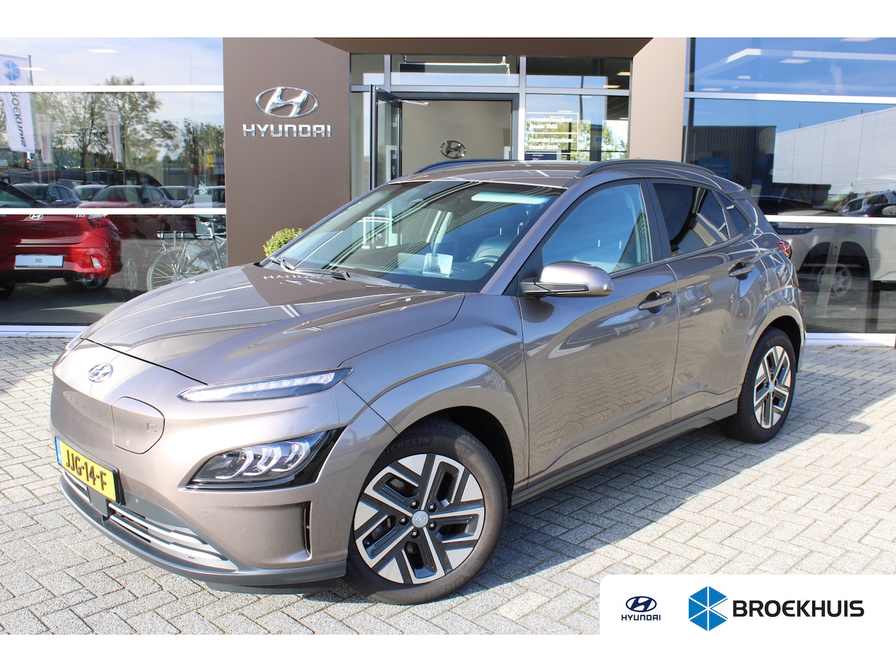Hyundai Kona Electric - EV Premium 64 kWh | 3 Fase | Lederen bekleding | Parkeersensoren voor en achter | Stoelver - AutoWereld.nl