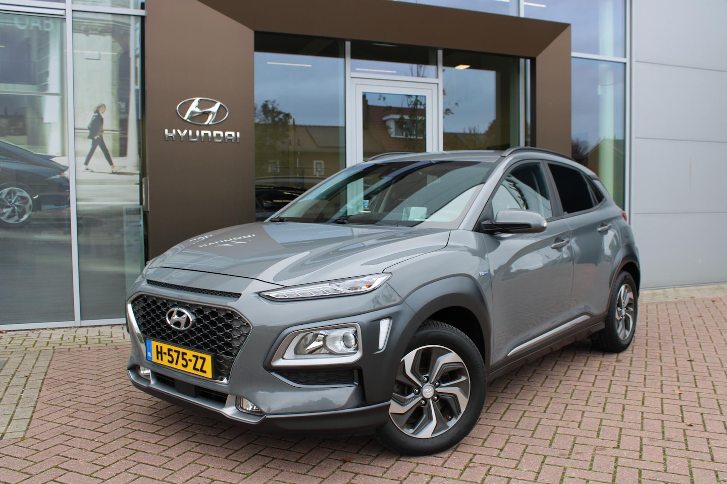 Hyundai Kona - 1.6 GDI HEV Fashion Automaat Hybrid Airco Navi Carplay Camera 1e eigenaar - AutoWereld.nl