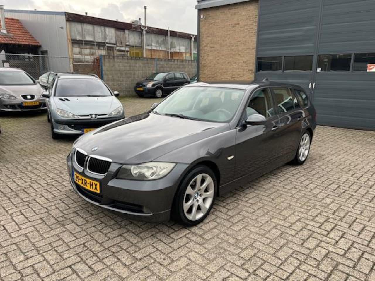 BMW 3-serie Touring - 318i Business Line//Vol onderhouden - AutoWereld.nl