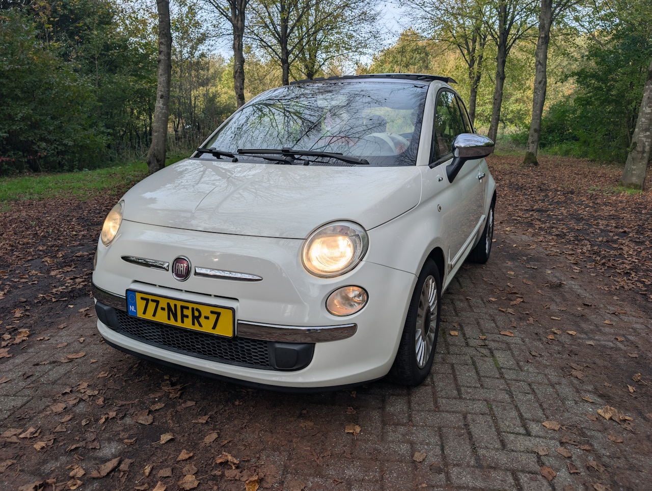 Fiat 500 - 1.2 Lounge Origineel NL | Elek. Schuif- /kanteldak | Lederen bekleding | Parkeersensoren - AutoWereld.nl