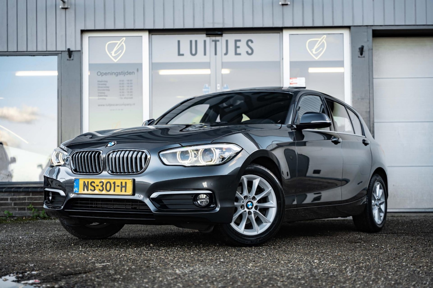 BMW 1-serie - 118i AUT8 High-Executive Schuifdak NL-auto 1e-eig. Dealer-ond. I Xenon I Bluetooth I Navi - AutoWereld.nl