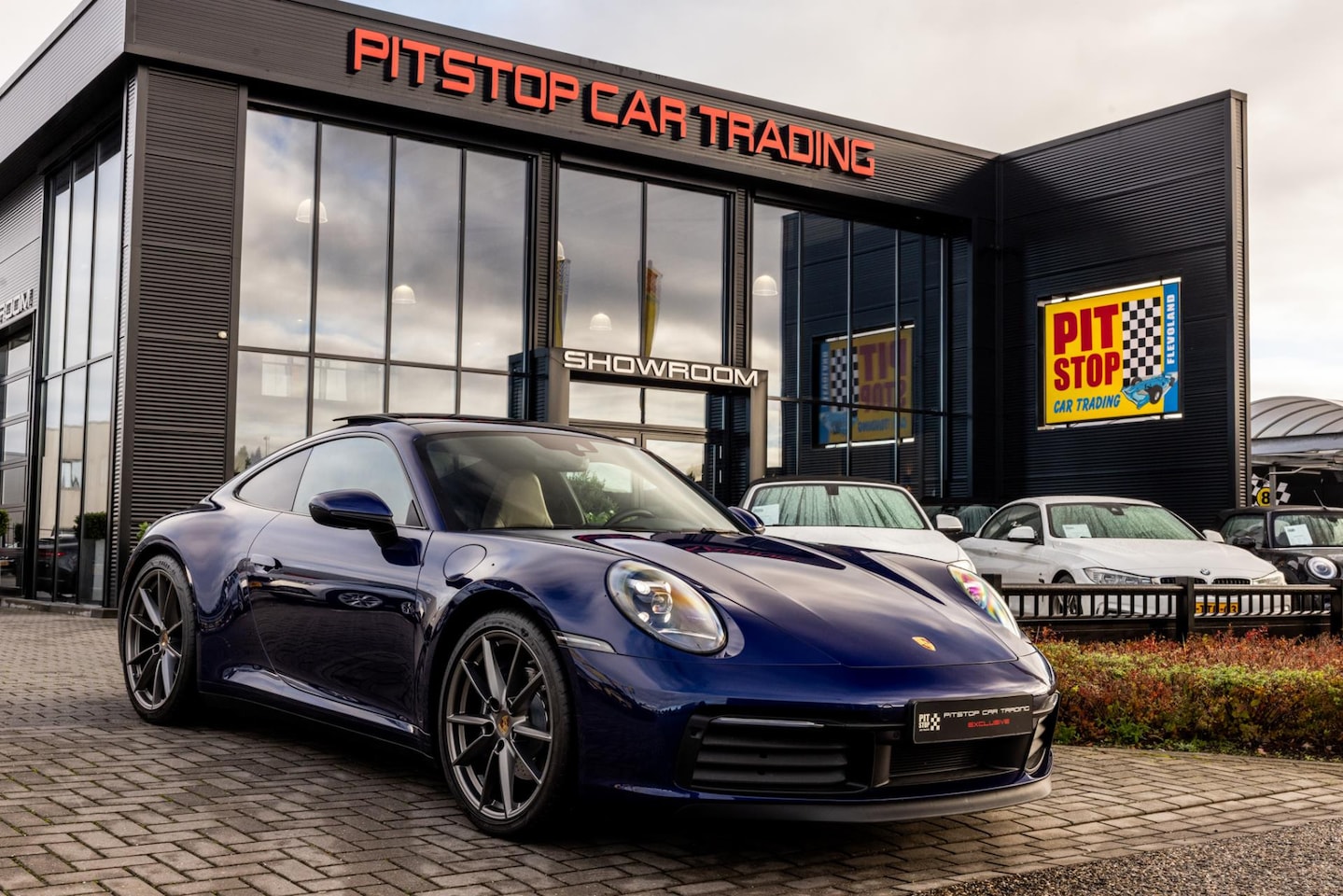 Porsche 911 - 992 3.0 Carrera, 385 PK, Pano, Sportuitlaat *Gentiaan Blauw* - AutoWereld.nl