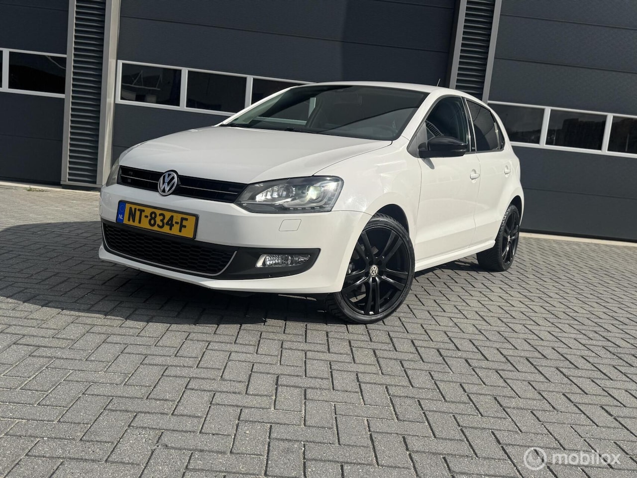 Volkswagen Polo - 1.6 TDI Highline 1.6 TDI Highline - AutoWereld.nl