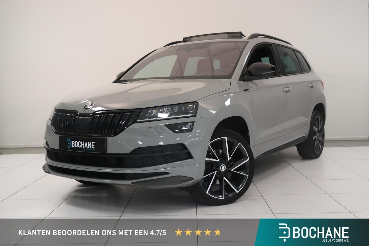 Skoda Karoq - 1.5 TSI ACT Sportline Business | Adaptieve cruisecontrol | Camera | Panoramadak | Trekhaak - AutoWereld.nl