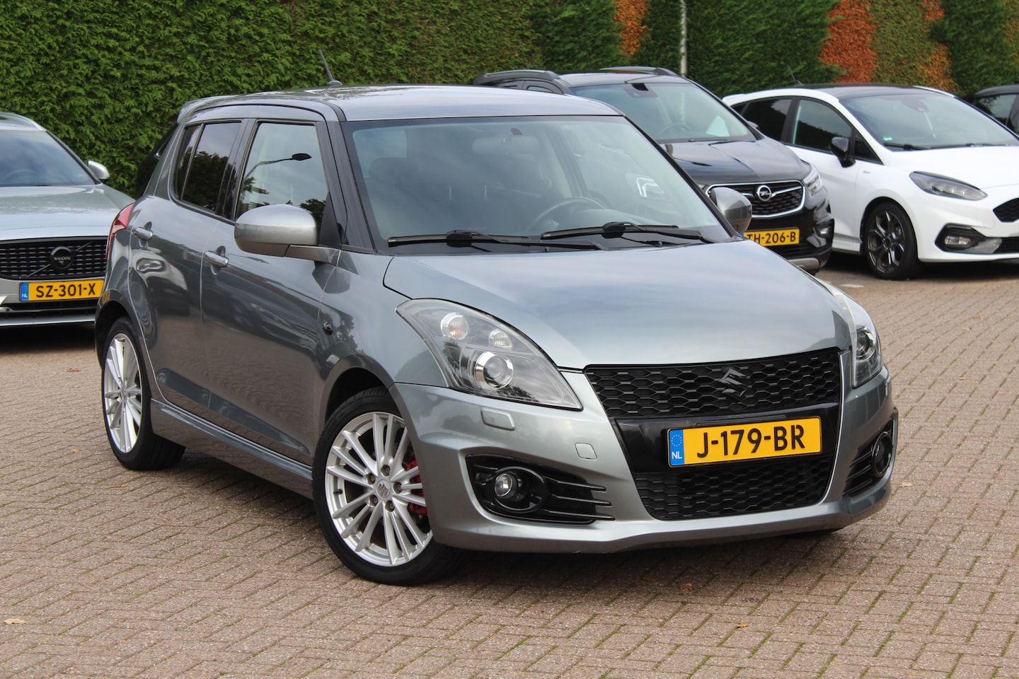Suzuki Swift - 1.6 Sport / Sportstoelen / Xenon / Stoelverwarming / Radio / 17'' / Cruise Control / Getin - AutoWereld.nl