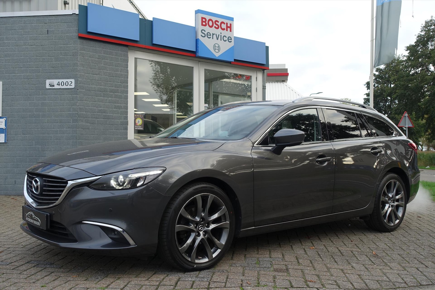 Mazda 6 - 2.5 SKYACTIV-G 192PK i-ELOOP AUT Skylease+ | BOSE | AFN TREKHAAK | 19'' | HUD | LED - AutoWereld.nl