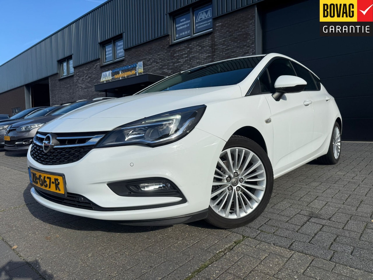 Opel Astra - 1.0 Innovation | 2E EIGENAAR | 12MND GARANTIE | NAVI | PDC | TREKHAAK | CRUISE | - AutoWereld.nl